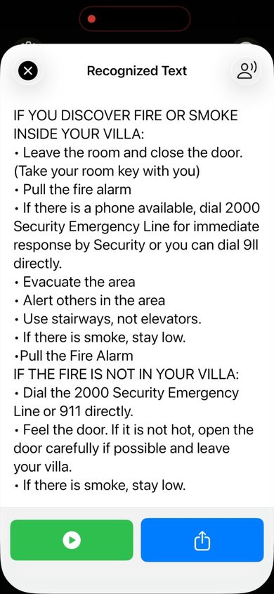 Sensory Reader Recognized Text panel showing OCR output of a hotel fire instructions document, with green Play button and blue Share button at the bottom